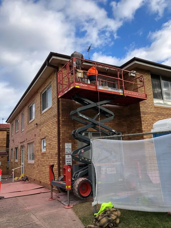 Brickwork remedial works from a scissor lift, Cronulla unit block