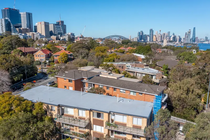 Completed rooftop waterproofing on a Wollstonecraft unit block, Sydney CBD behind